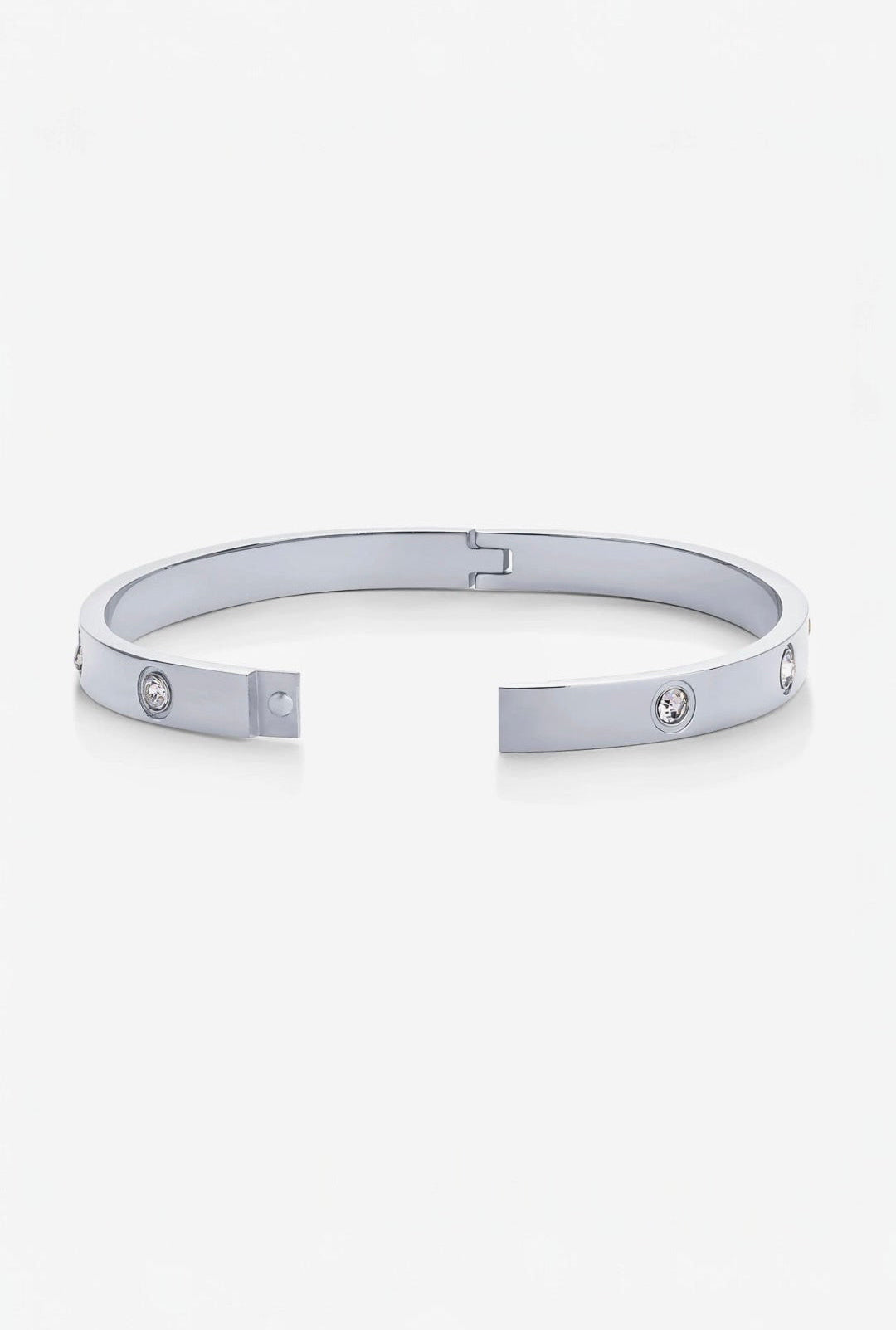 Silver bracelet with small stones on a white background